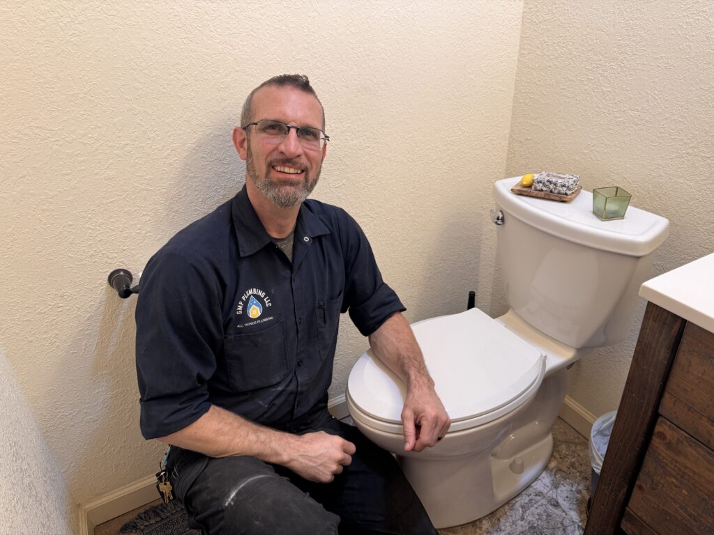 GMP Plumbing with Gabriel performing toilet repair